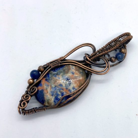Sodalite set in copper wirework with sodalite and copper beads