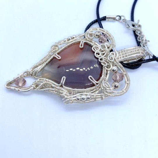 Agate wrapped in silverfilled wire