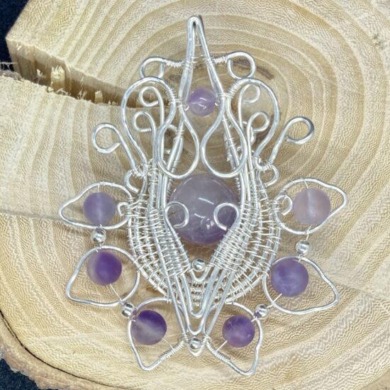 Amethyst beads in silver filled wire
