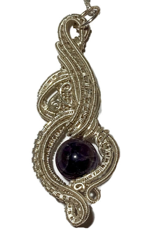 Intricate wire weaved pendant